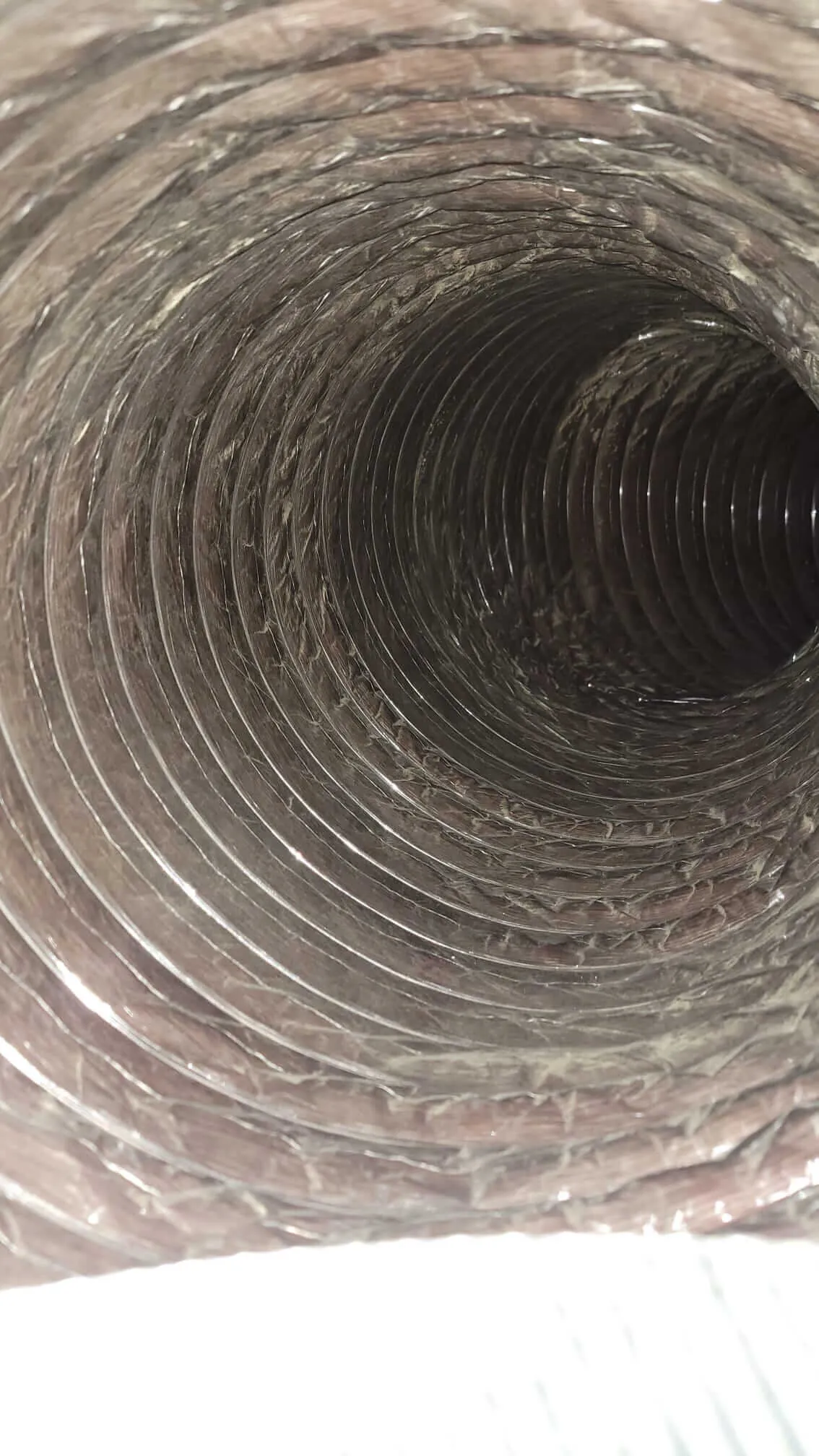 A dirty air duct that needs cleaning